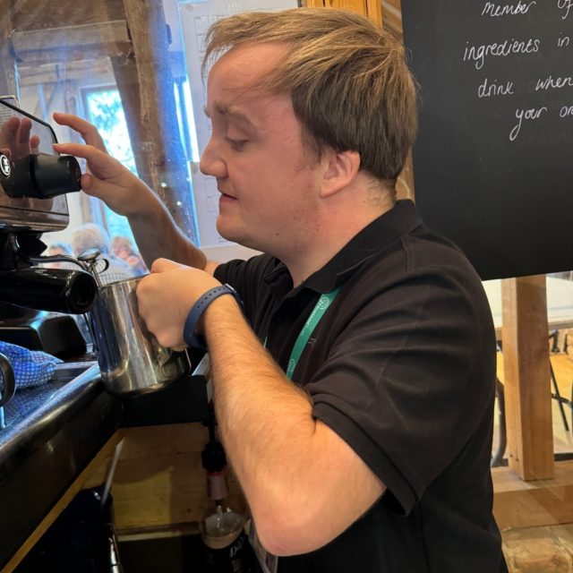 Starting off as a volunteer that we support, before progressing onto being a part-time member of the team here at Hanger Farm, Jacques has quickly become everyone’s favourite barista. We wanted to get some action shots of Jacques in the process of making our visitors some coffees. 

From using the coffee machine to craft the perfect foam for a latte, to adding a healthy smattering of chocolate atop a cappuccino – Jacques continues to be a cheeky and friendly staff member as well as a Hanger Farm staple
