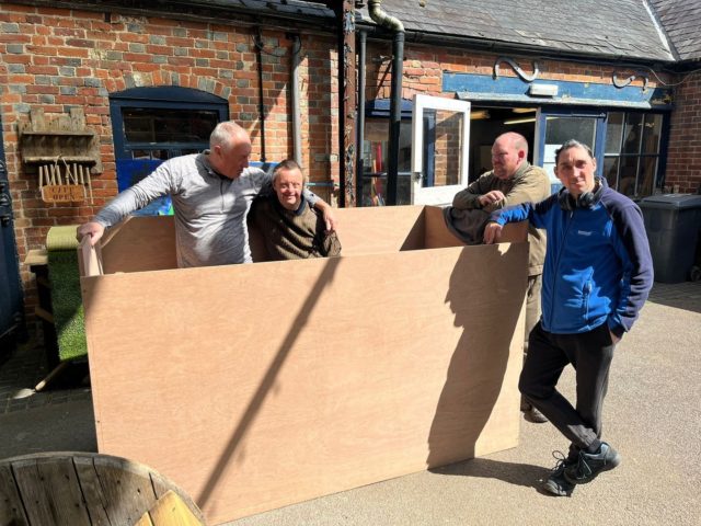 What is this giant wooden box? 

Well, it’s been build by the supported woodwork team to house the mechanics of the waterfall for our Hampton Court show garden. 

DJ and Ed love to help out with the drill, helping to fix the box together. And of course instructor John had to test it out for size with Simon! 

Can you support us to recreate some of the calm and magic of the Furzey pond at Hampton Court show this summer? 
Follow the link in our bio..